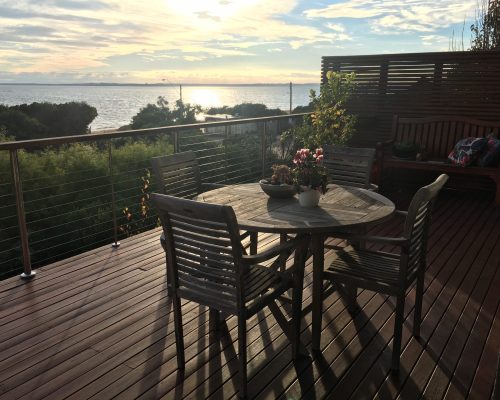 peaceful-ocean-view-from-deck-at-sunset-2026-03-09-09-01-18-utc